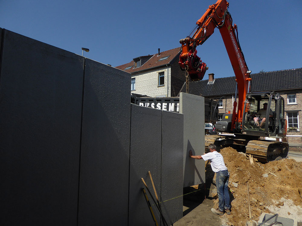 Pose de L béton dans une rampe de garage